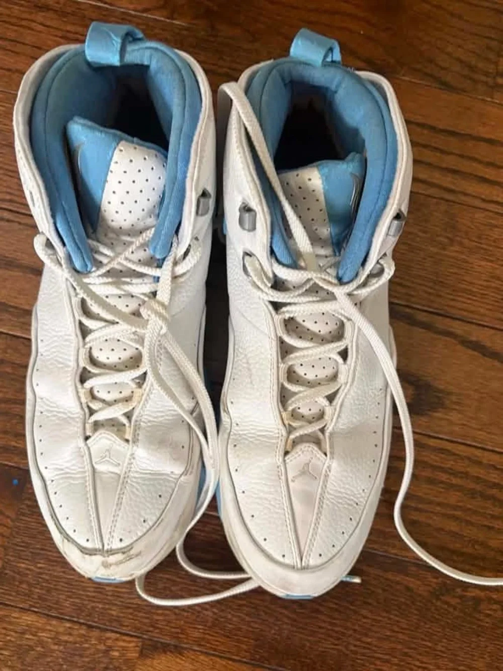 Jordan White with Light Blue High-Top Basketball Sneakers